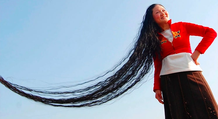 Фото женщины с самыми длинными волосами